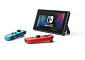 Nintendo Switch console with neon red&amp;blue Joy-Con