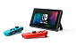 Nintendo Switch console with neon blue&amp;red Joy-Con